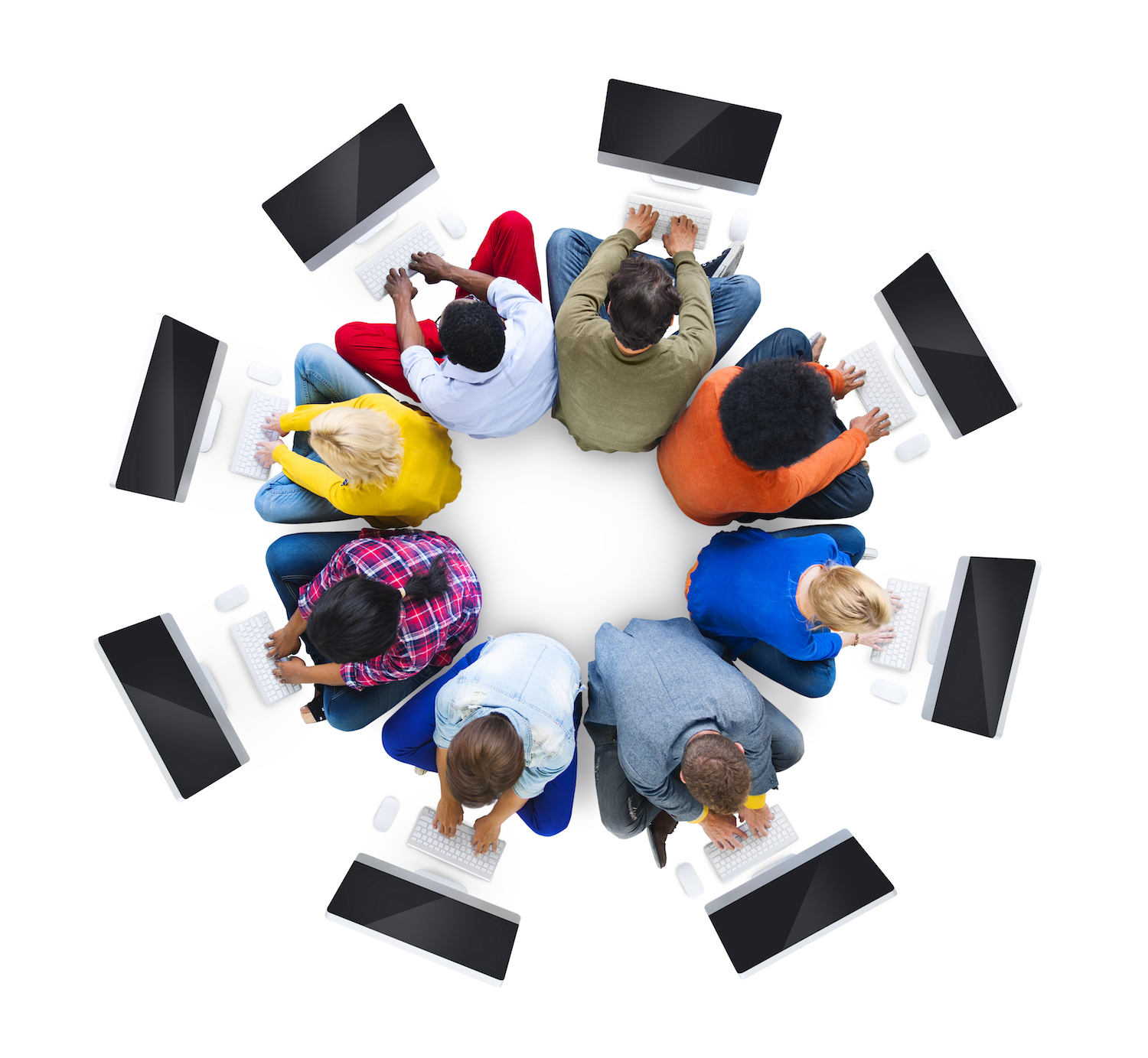 social media marketing team sitting in circle using computers